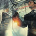 Two businessmen in suits shaking hands, with a double exposure effect showing modern office buildings and city lights, symbolizing partnership and corporate collaboration. | MAKE1M