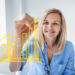A woman in a blue shirt smiles while drawing an upward-trending yellow bar and line graph on a transparent screen in a bright office setting. | MAKE1M